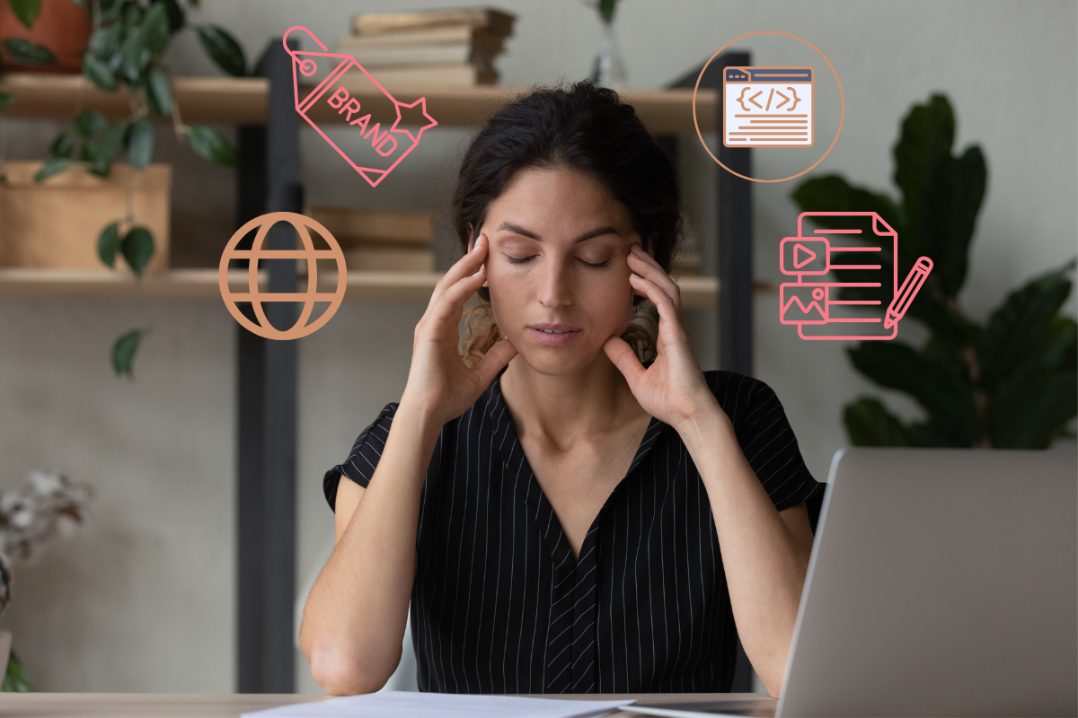 Woman working on laptop looking overwhelmed